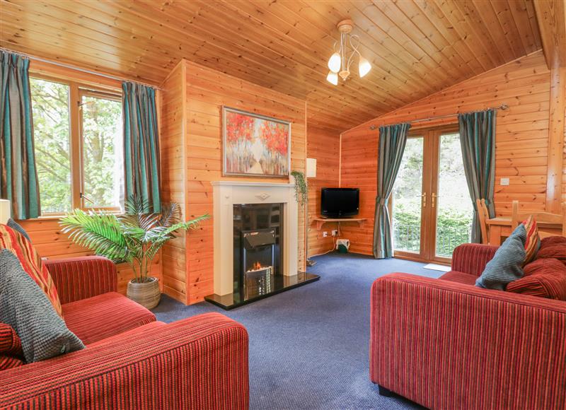 Relax in the living area at Elm Lodge, Keswick