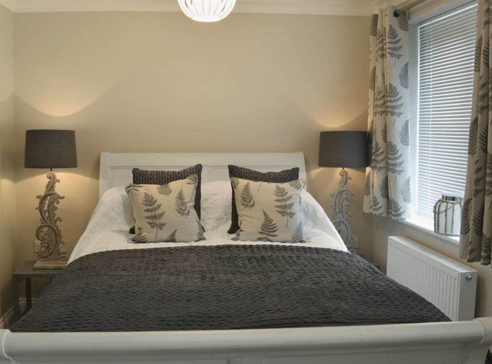 Charming double bedroom with quality furnishings at Elm Tree Cottage at Cottage Farm in Foxholes, near Scarborough, North Yorkshire