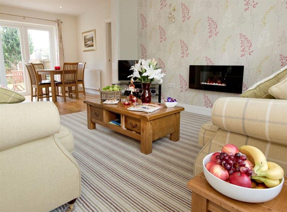 Spacious living and dining room at Elmcot in Keswick, Cumbria