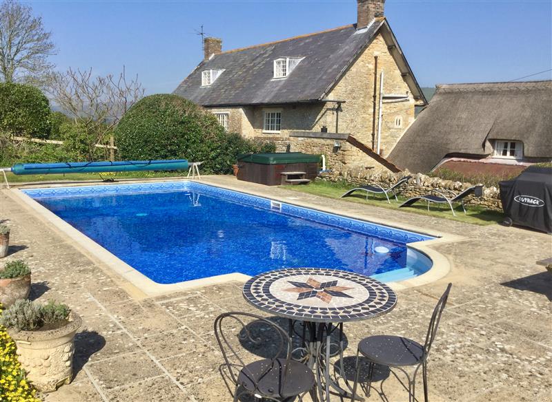 Enjoy the swimming pool at Elworth Farmhouse Cottage, Elworth near Abbotsbury