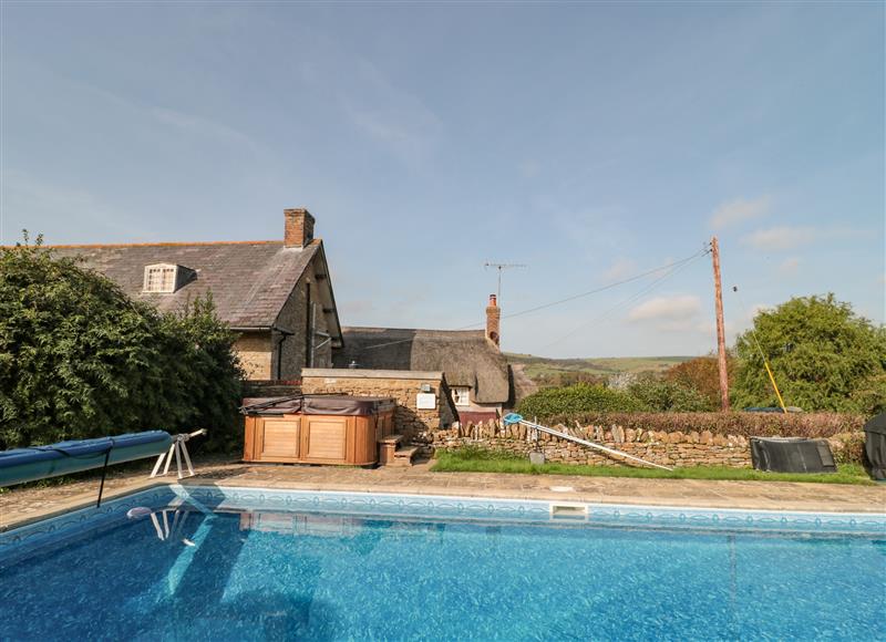 There is a swimming pool at Elworth Farmhouse Cottage, Elworth near Abbotsbury