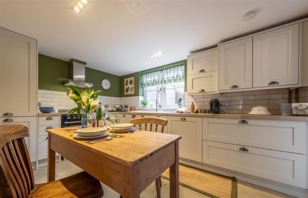 Ground floor: A dining area for two at Ember Cottage, Litcham near Kings Lynn