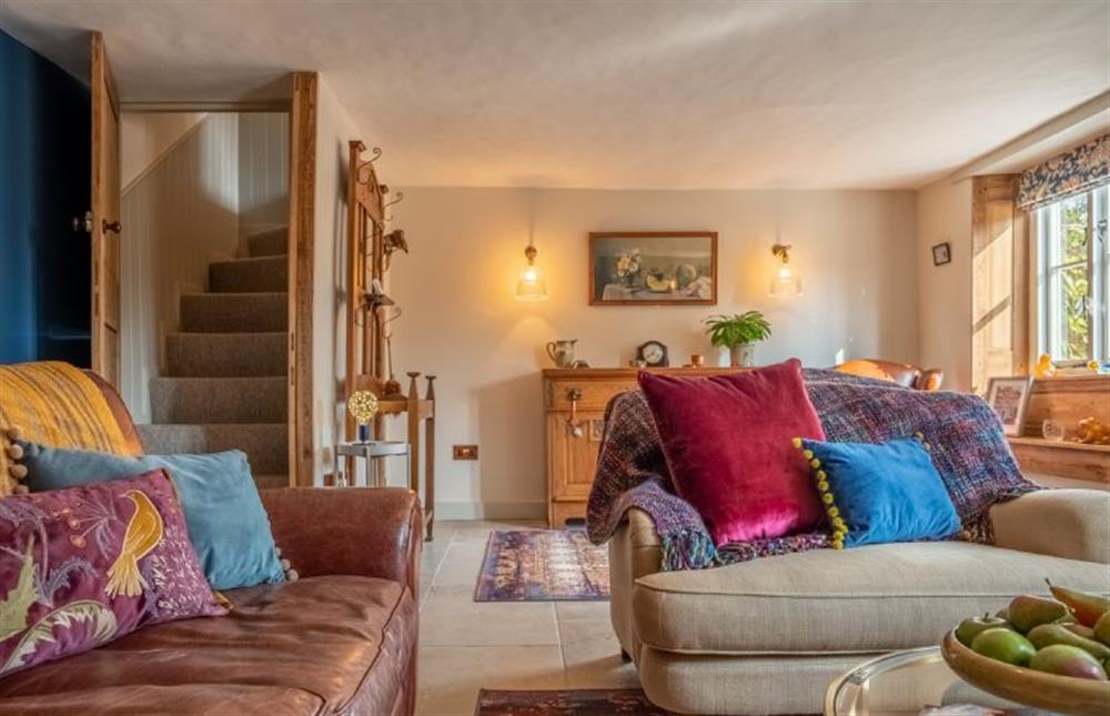 Ground floor:  From the sitting room a stairway leads to the first floor at Ember Cottage, Litcham near Kings Lynn