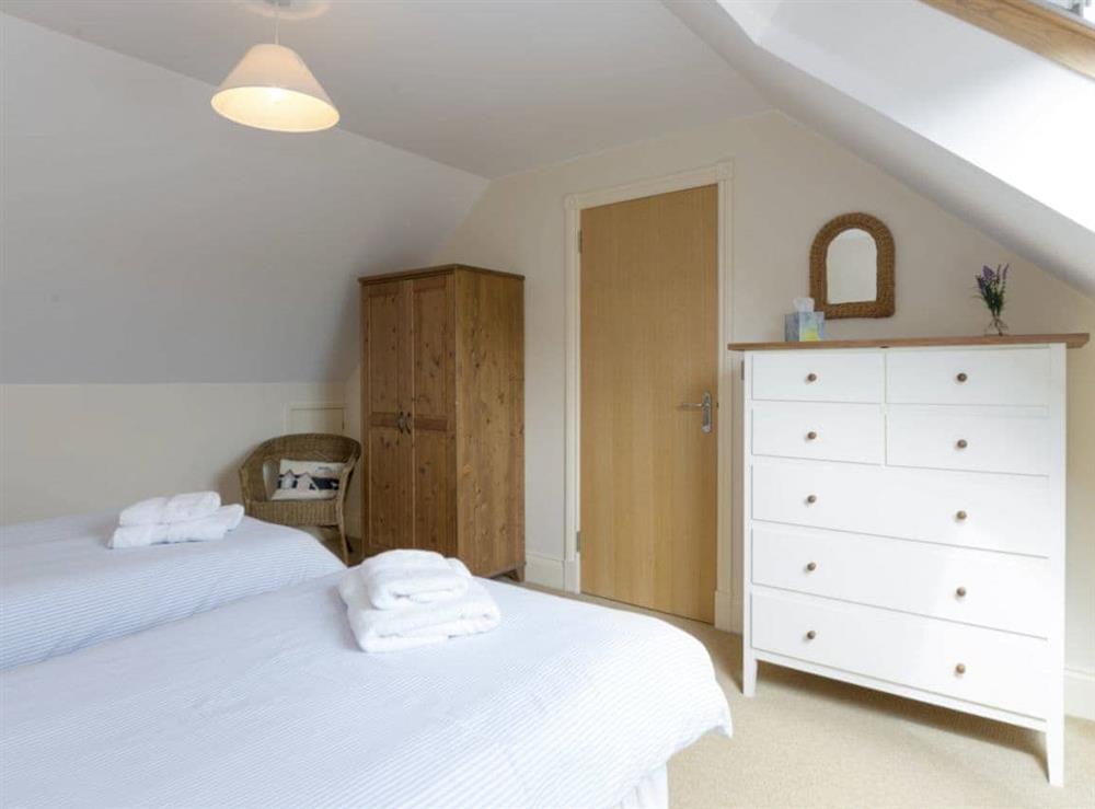 Ample storage within twin bedroom at Embleton Cottage in Beadnell, Northumberland