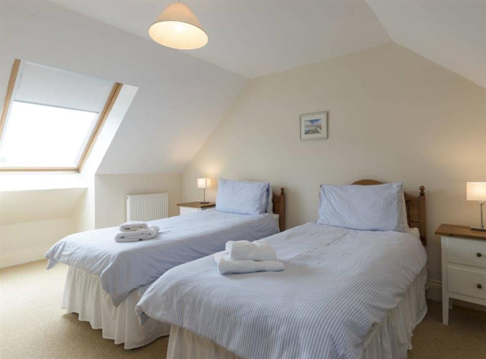 Good-sized twin bedroom at Embleton Cottage in Beadnell, Northumberland