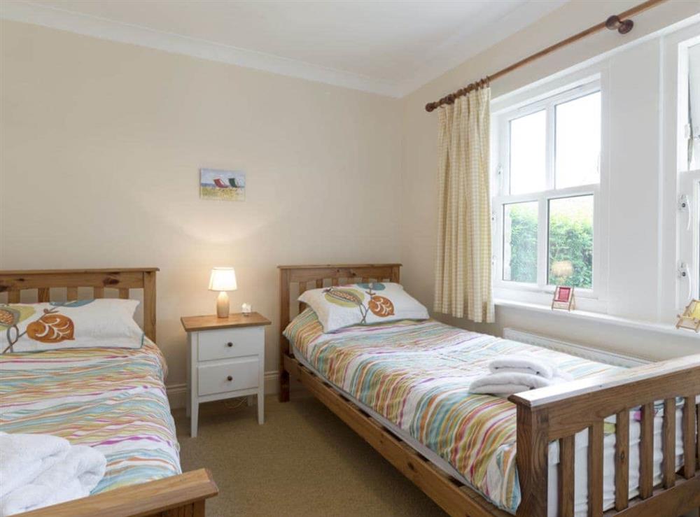 Light and airy twin bedroom at Embleton Cottage in Beadnell, Northumberland