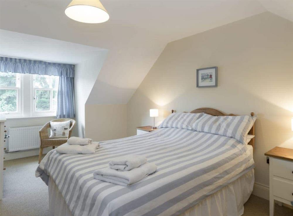 Relaxing master bedroom at Embleton Cottage in Beadnell, Northumberland