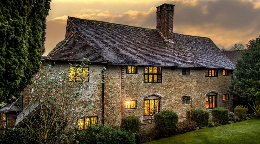 The exterior of Emley Farmhouse at Emley Farmhouse in Godalming, Surrey