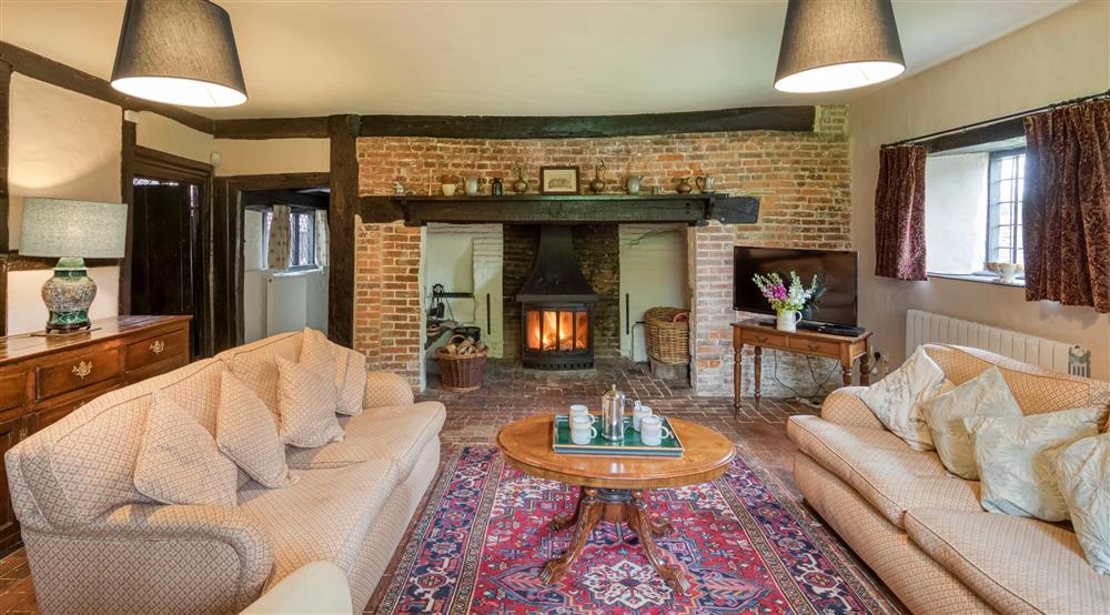 The first sitting room at Emley Farmhouse in Godalming, Surrey