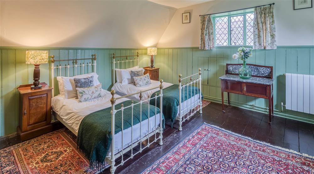 The first twin bedroom at Emley Farmhouse in Godalming, Surrey