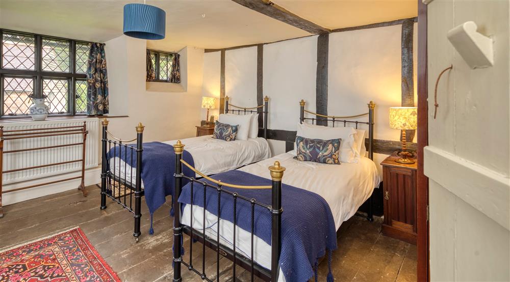 The second twin bedroom at Emley Farmhouse in Godalming, Surrey