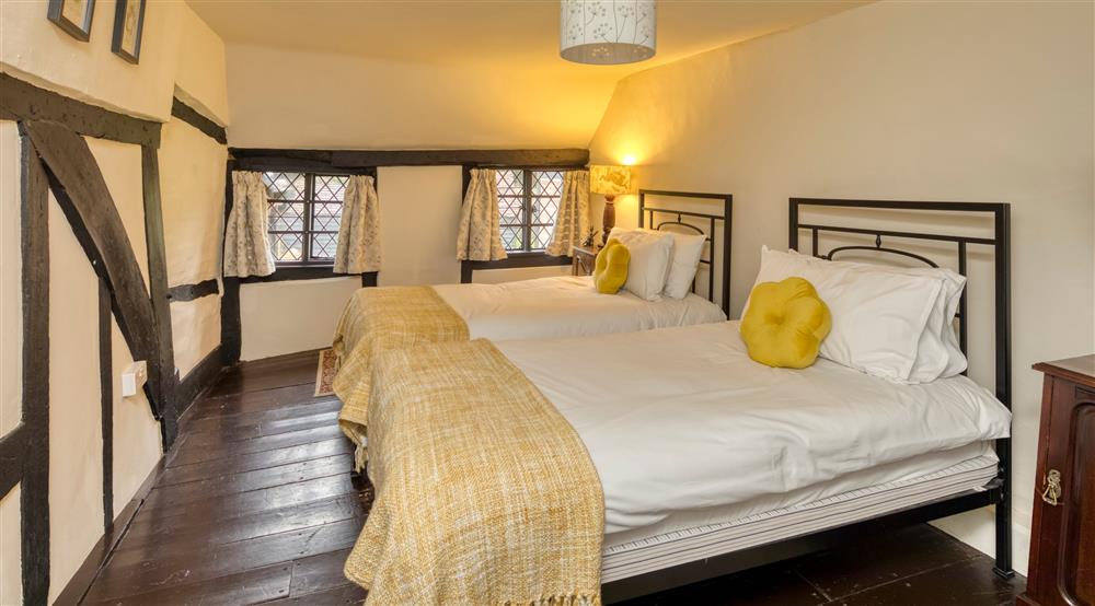 The third twin bedroom at Emley Farmhouse in Godalming, Surrey