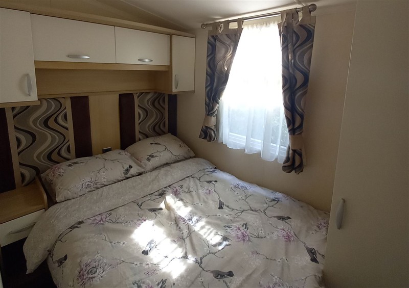 This is a bedroom (photo 2) at Emma 6, Llandegfan