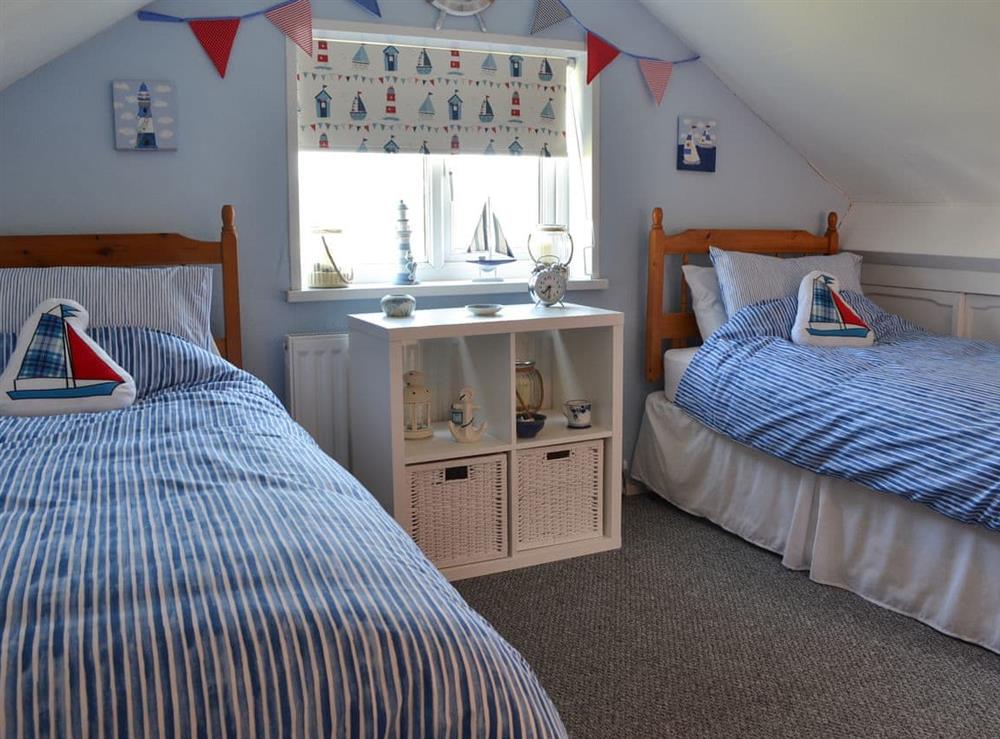 Twin bedroom at Encil-Y-Mor in Criccieth, near Porthmadog, Gwynedd, Wales
