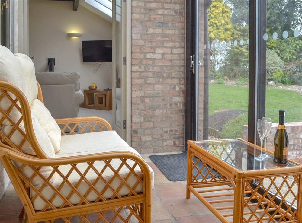 Light and airy conservatory at End Cottage in Tibthorpe, near Driffield, North Humberside