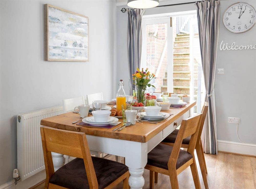Light and airy dining space at Endeavour Cottage in Whitby, North Yorkshire