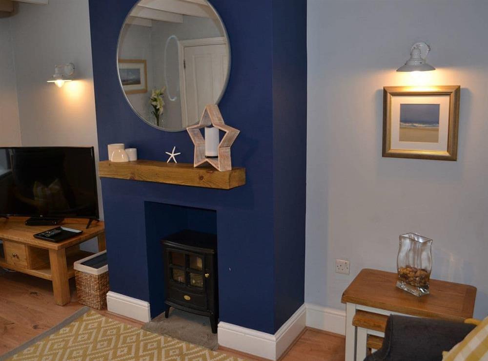 Living area at Endeavour Cottage in Whitby, North Yorkshire