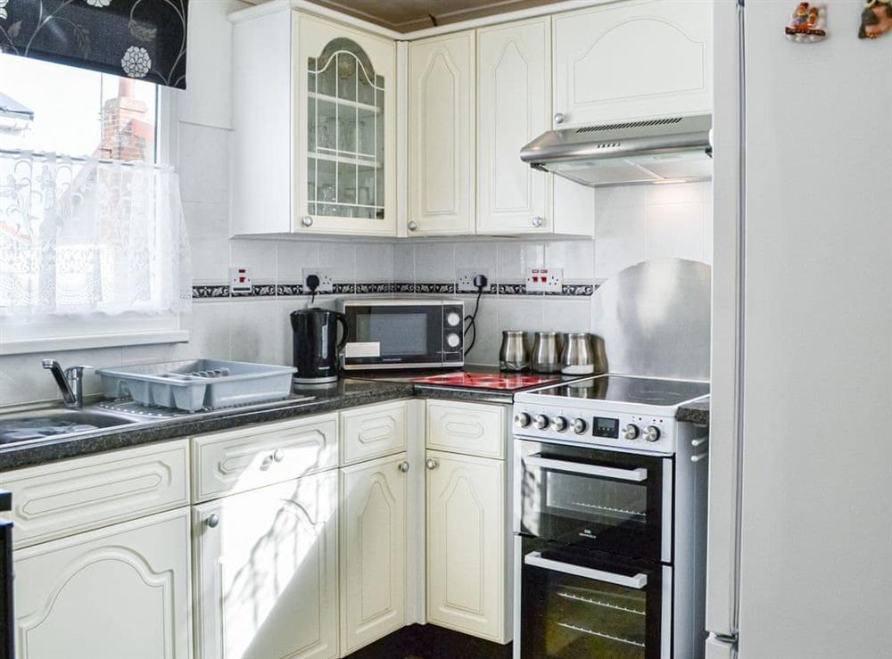Kitchen at Enjoy Your Stay Cottage in Bridlington, North Humberside