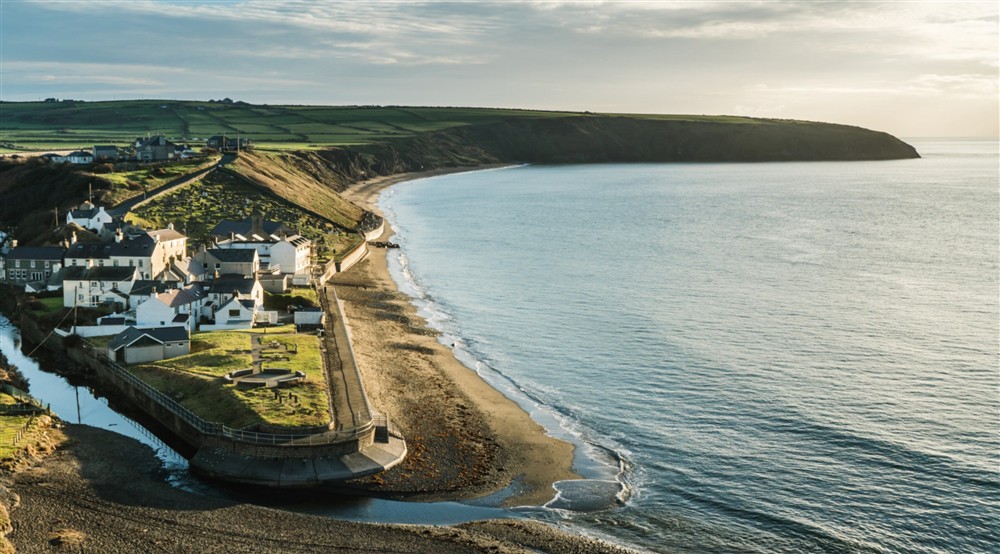 An aerial view of Aberdaron village and beach, Gwynedd at Enlli in Pwllheli, Gwynedd
