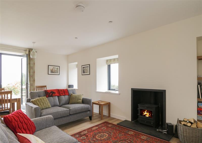 Relax in the living area at Enzie Station Cottage, Buckie