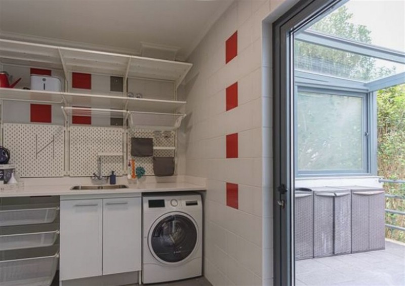 The kitchen at Equinox: Elegant house with a swimming pool, Cornwall