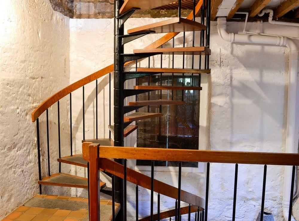 Open tread, spiral stairs at Erbistock Mill in Erbistock, near Llangollen, Clwyd