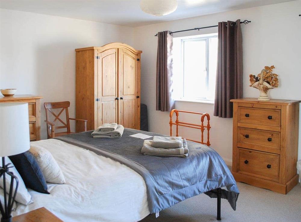 Welcoming double bedroom at Erskine Cottage in Seahouses, Northumberland
