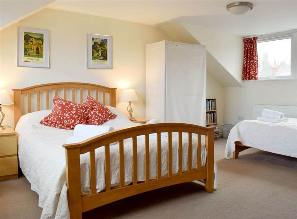 Family bedroom with double bed and additional single bed at Esk View in Whitby, Yorkshire Coast & Wolds