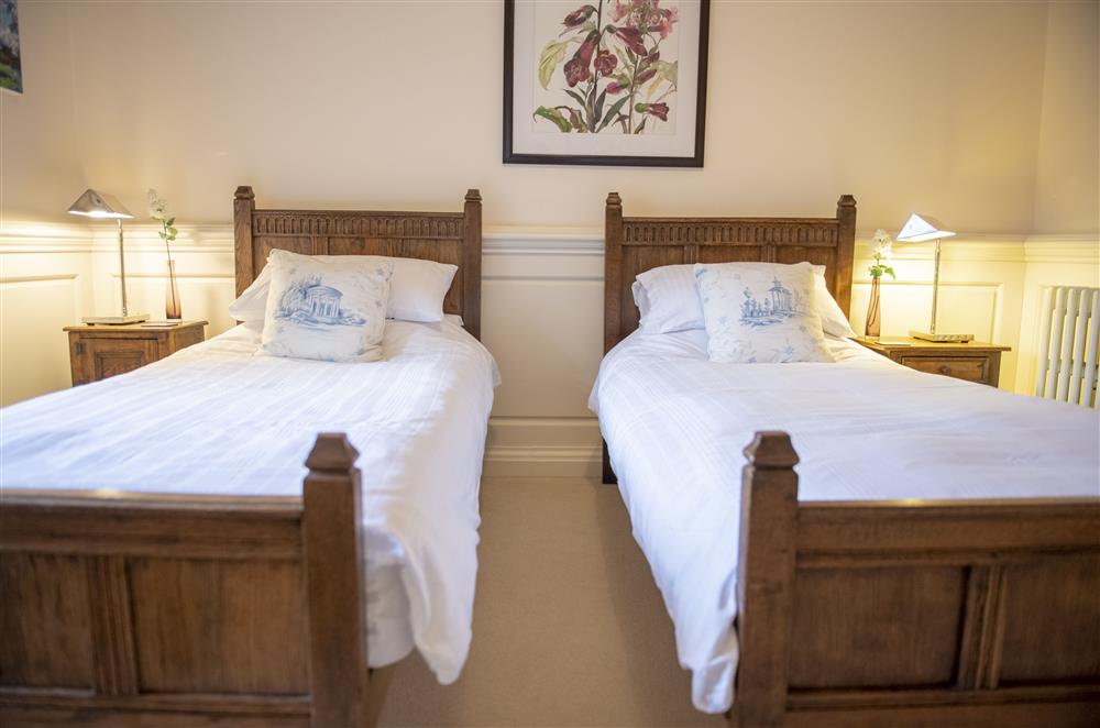 Bedroom four with twin 3’ single beds and en-suite at Eslington East Wing, Alnwick