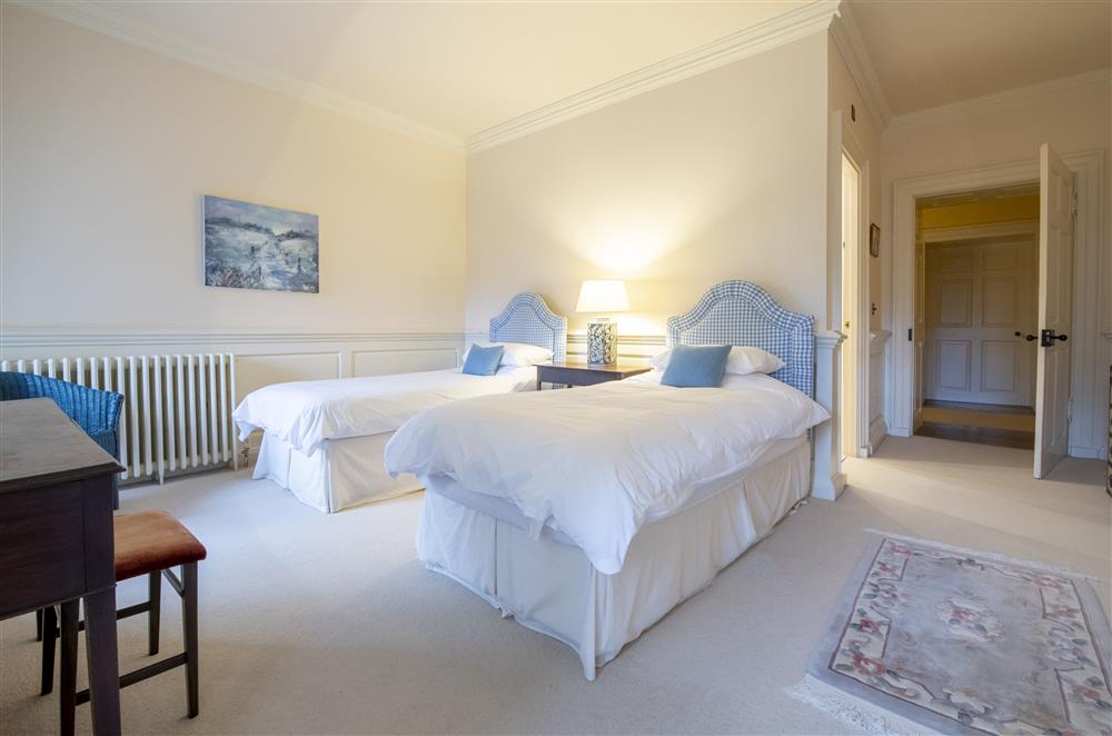 Bedroom three with twin 3’ single beds and en-suite  at Eslington East Wing, Alnwick