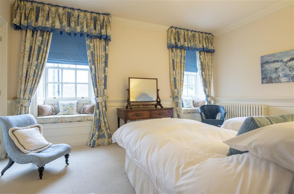 Enjoy the views from the window seats in bedroom three at Eslington East Wing, Alnwick