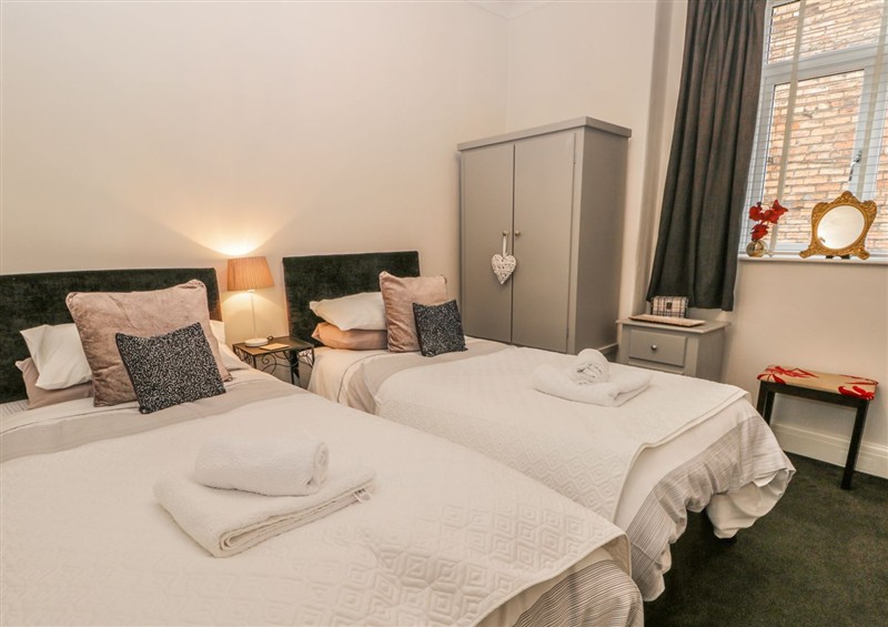 This is a bedroom at Esplanade Gardens, Apartment 1, Scarborough