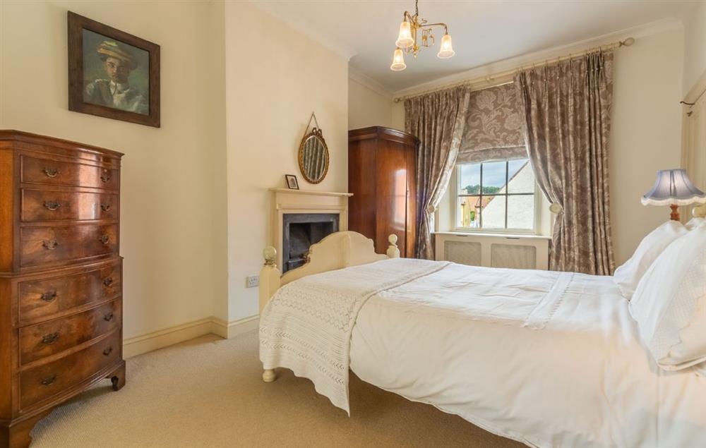 Bedroom two with a 4’6 double bed and en-suite shower room at Estcourt House, Burnham Market
