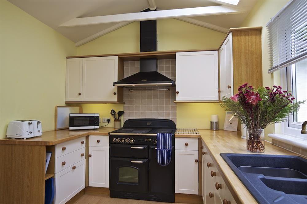 Fully fitted kitchen with electric range cooker (photo 2) at Estuary House in , South Pool, Kingsbridge