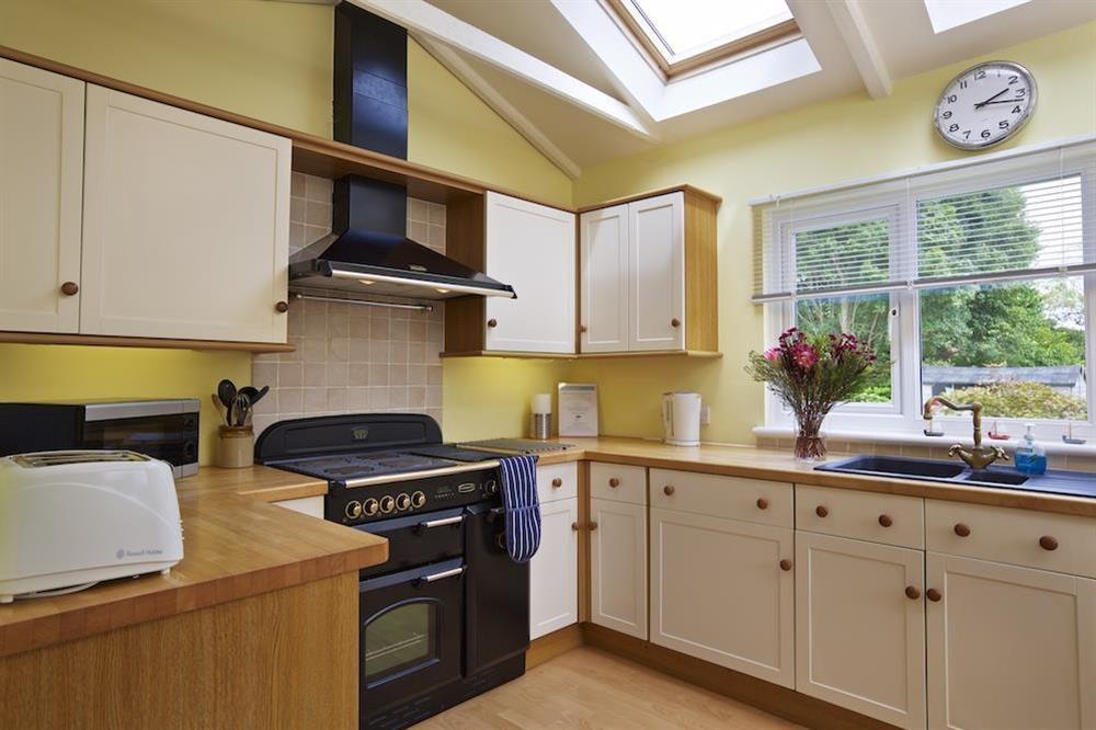 Fully fitted kitchen with electric range cooker at Estuary House in , South Pool, Kingsbridge