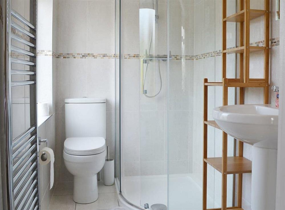 En-suite shower room with heated towel rail at Estuary View in Exmouth, Devon