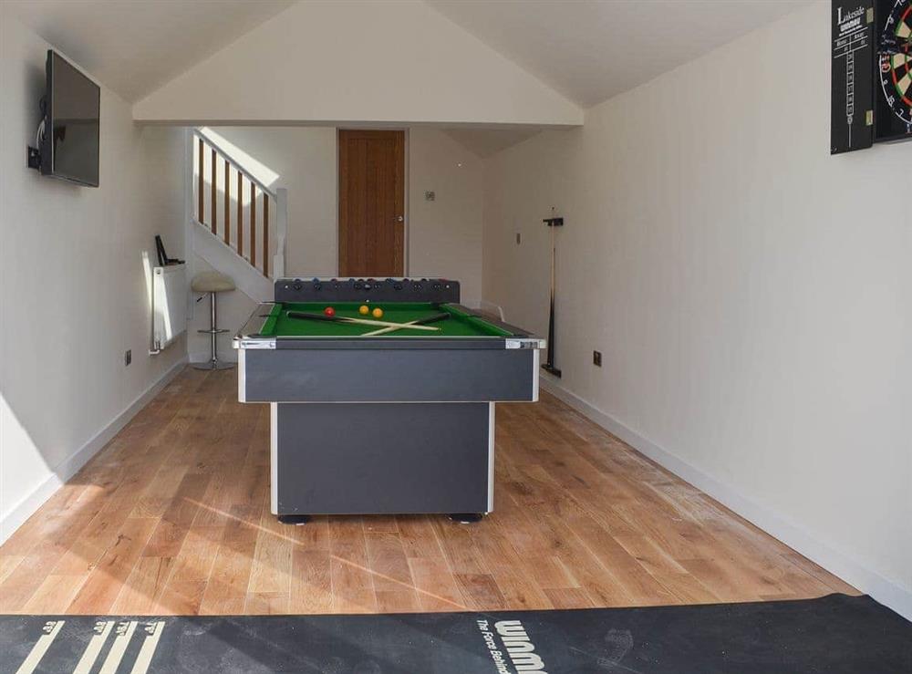 Games room with traditional pub games at Estuary View in Exmouth, Devon