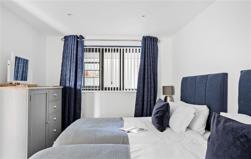 This is a bedroom (photo 2) at