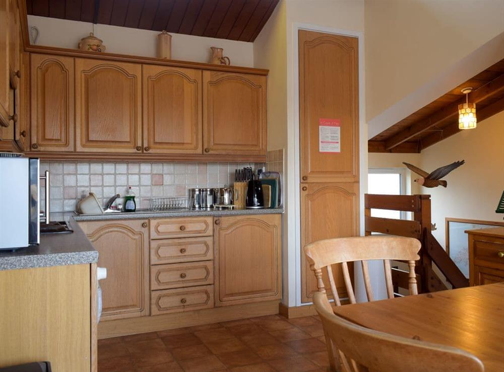 Kitchen and dining area at Estuary View in Porthmadog, Gwynedd