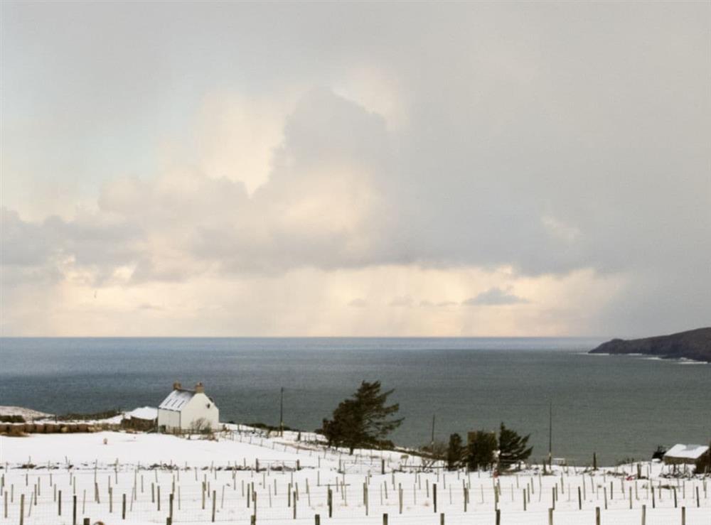 A wintery view of the property and out to sea at Ethels House in Armadale, near Bettyhill, Highlands, Caithness