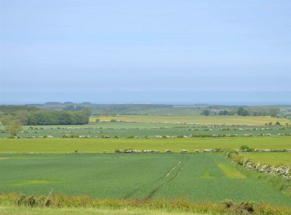 There is a fine view across the rolling countryside to the North Sea coast