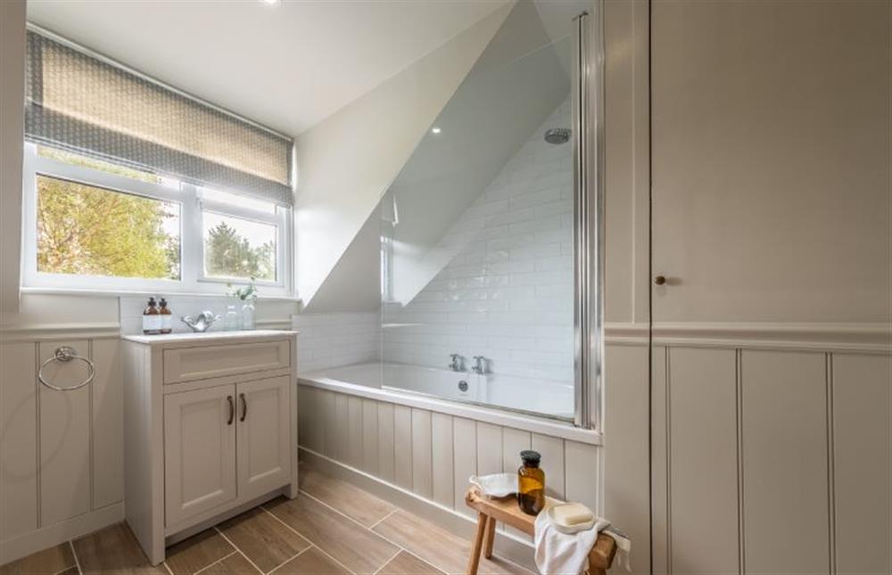 First floor: Bathroom with bath and shower over at Evergreen, Thornage near Holt