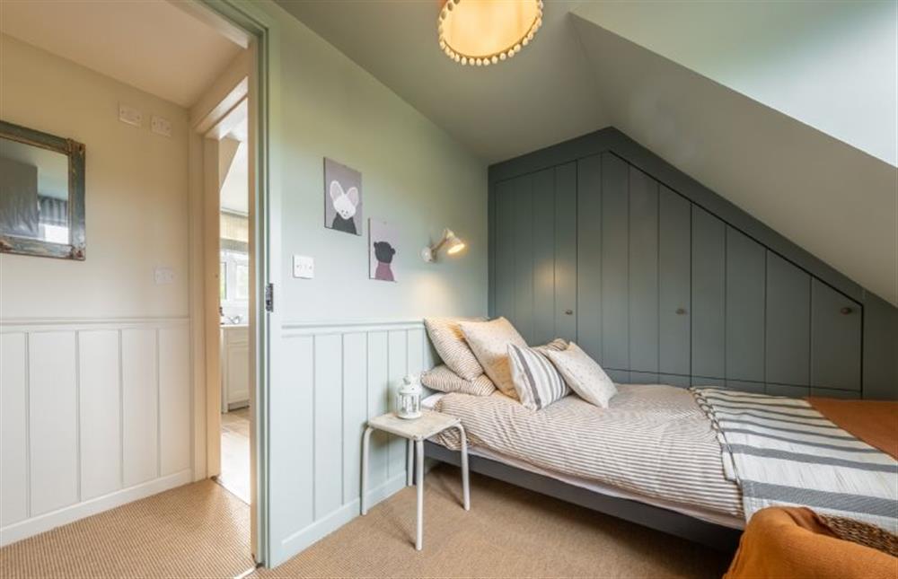 First floor: Bedroom three with twin single beds at Evergreen, Thornage near Holt