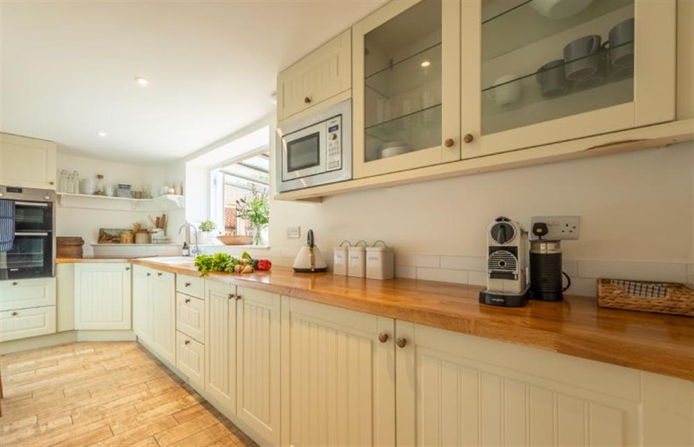 Ground floor: Galley-style fitted kitchen at Evergreen, Thornage near Holt