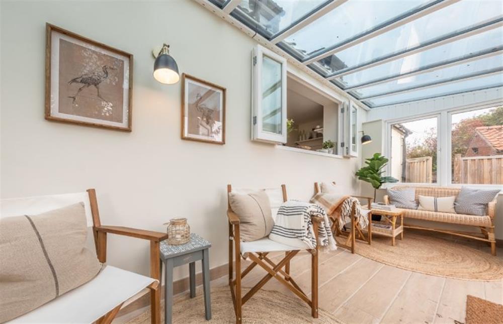Ground floor: Garden room seating to enjoy the view at Evergreen, Thornage near Holt