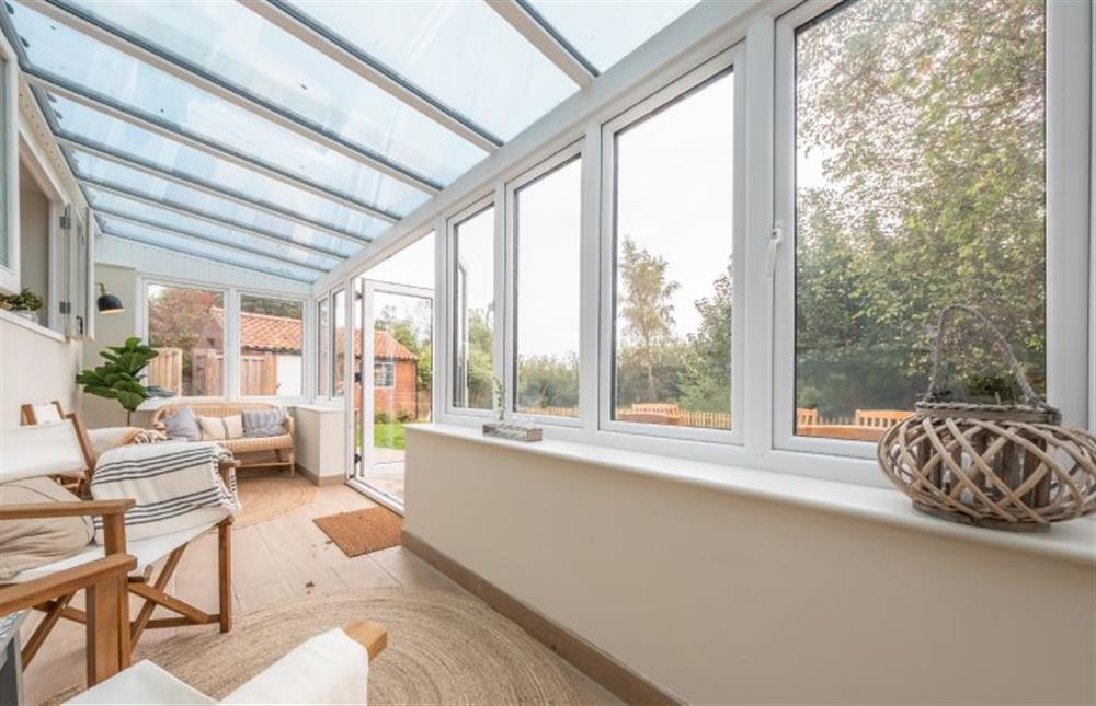 Ground floor: The sunny south facing garden room at Evergreen, Thornage near Holt