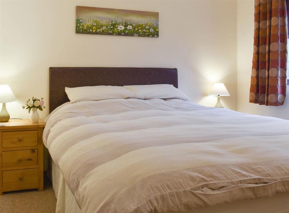 Relaxing double bedroom at Hornbeam Lodge, 