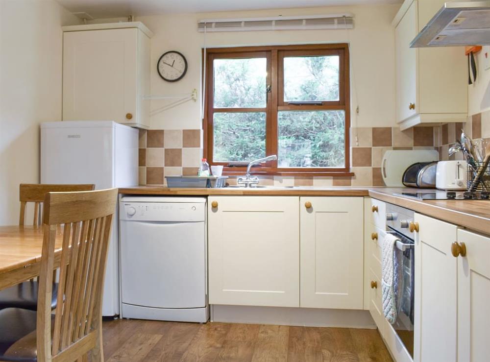 Fully appointed kitchen with dining area at Oak Lodge, 