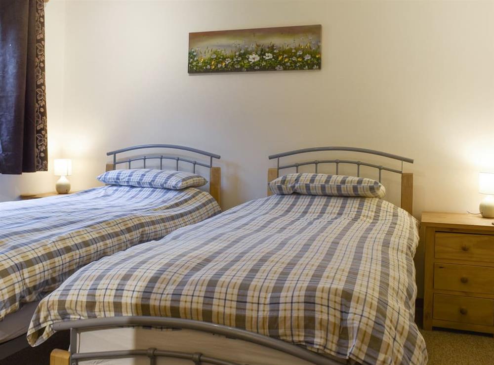 Comfortable twin bedroom at Silver Birch Lodge, 