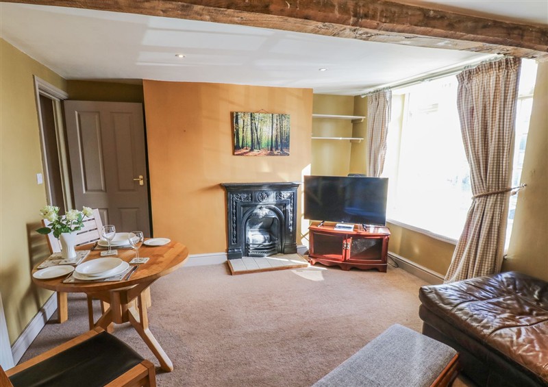 Relax in the living area at Ewe Cottage, Masham